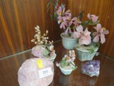 A couple of pieces of rose quartz ? amethyst etc