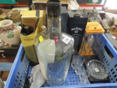 A tray containing whisky related items including a large Famous Grouse 4.5 litre bottle