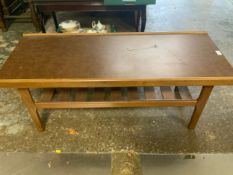 A mid-century teak two tier table with Formica top