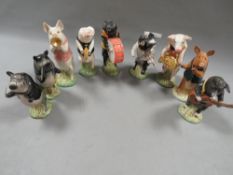 Nine Beswick pig band figures