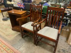 A pair of oak barleytwist armchairs together with a small mahogany bookcase