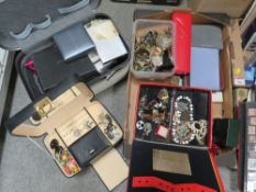 A large tray of costume jewellery to include jewellery boxes etc