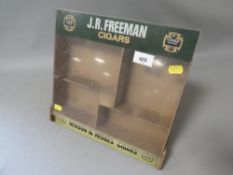 A vintage counter display cabinet for Benson & Hedges cigars and J.R. Freemans cigars