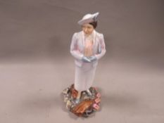 A Royal Doulton limited edition figurine HM Queen Elizabeth The Queen Mother 869