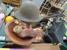 A tray of assorted collectables to include a tin army hat, candlesticks etc