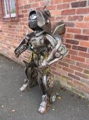 A large 'scratch built 'Scrap Metal' transformer / robot model, made from car parts, motorcycle and