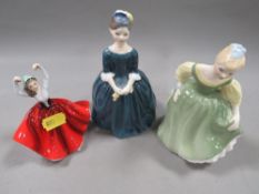 Three small Royal Doulton figurines to include 