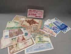 A collection of vintage world banknotes