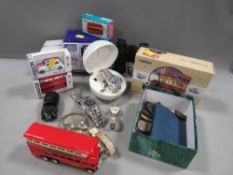 A box of collectables to include Corgi models, watches, coins etc