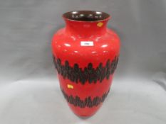 A large red West German ceramic vase
