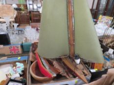 A tray of treen etc to include a novelty wooden lamp in the form of a yacht