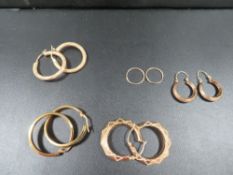 A collection of yellow metal earrings to include 375 example approx. combined weight 8g