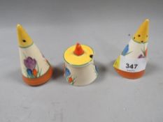 A Clarice Cliff three piece Bizarre Crocus pattern cruet set