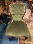 A mid Victorian mahogany spoon back, upholstered ladies chair