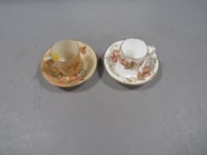 A pair 19th century Grainger's Worcester demitasse cups and saucers