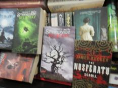 Three large boxes of of hardback and paper back books (trays not included)