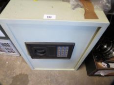 A large digital safe with key