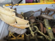 A tray of assorted metal ware to include a cannon, sail ship door stop, fire dogs etc