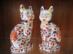 Two reproduction ceramic cat figures