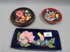 Two Moorcroft pin dishes together with a Moorcroft pin tray (3)