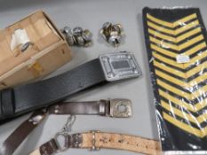 A collection of assorted militaria and collectables to include British Rail buttons etc., various