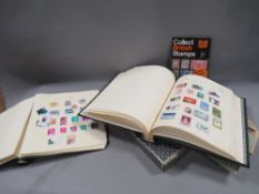 Two albums of British and world stamps