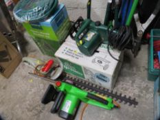 A selection of garden tools to include chainsaws and hedge trimmers