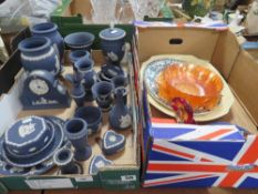 A tray of dark blue Wedgwood Jasperware to include vases, desk clock together with a tray of