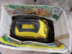 A boxed Karcher pressure washer