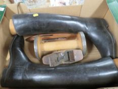 A pair of black leather riding boots with boot lasts, loom shuttle etc