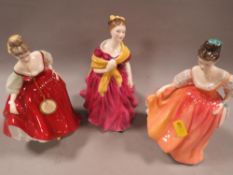 Three Royal Doulton figurines to include 