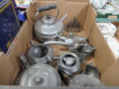 A tray of assorted metal ware to include novelty dog nut cracker etc