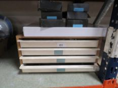 A vintage set of drawers containing Lego style letter blocks etc