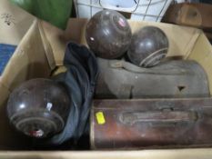 A quantity of vintage lawn bowls etc