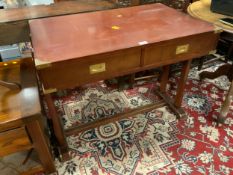 A reproduction mahogany two drawer campaign style desk W 91 cm