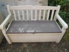 A plastic garden storage cupboard