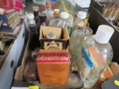 A small tray of vintage pharmaceutical items to include vintage bottles