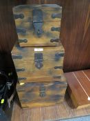 Three modern colonial style graduated storage boxes