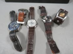 Five assorted wrist watches to include Lorus, Timberland, Diesel & Accurist etc.