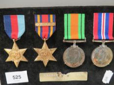 A collection of four WWII medals and a pacific bar PJX426436F.GASKIN Royal Navy