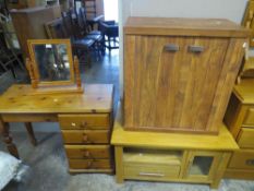 Three modern items of furniture to include a solid pine dressing table, a two door drinks cabinet