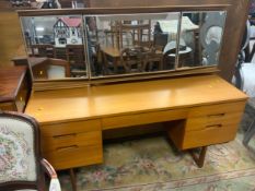 A mid-century teak UniFlex dressing table W 153 cm