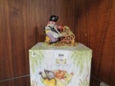 A Royal Doulton Wind in the Willow's 'every hole possessed a face' boxed figure