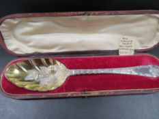An early hallmarked silver cased berry spoon