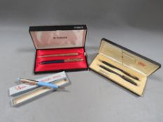 A selection of collectable pens to include Parker