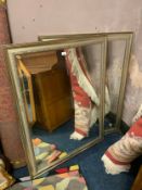 A pair of large modern silver framed rectangular wall mirrors 115 x 89 cm. (2)