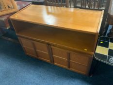 A mid-century teak cabinet