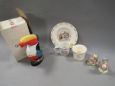 A boxed Guinness beer money ceramic toucan money box together with Royal albert Beatrix potter and