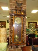 A large gong strike Vienna wall clock with eagle surmount