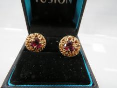 A pair of hallmarked 9 carat gold gem set earrings approx. weight 3.8g